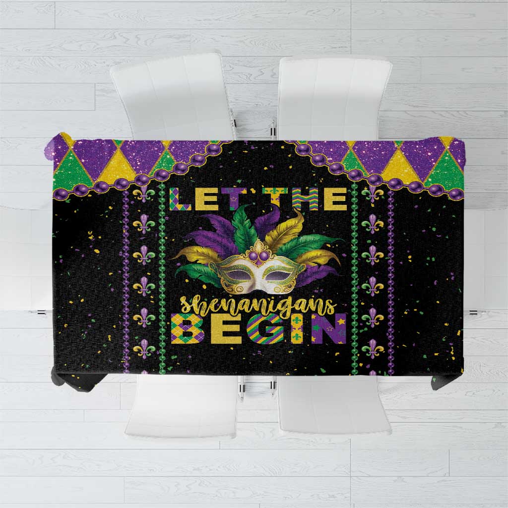 Black Mardi Gras tablecloth reading “Let the Shenanigans Begin” with fleur-de-lis