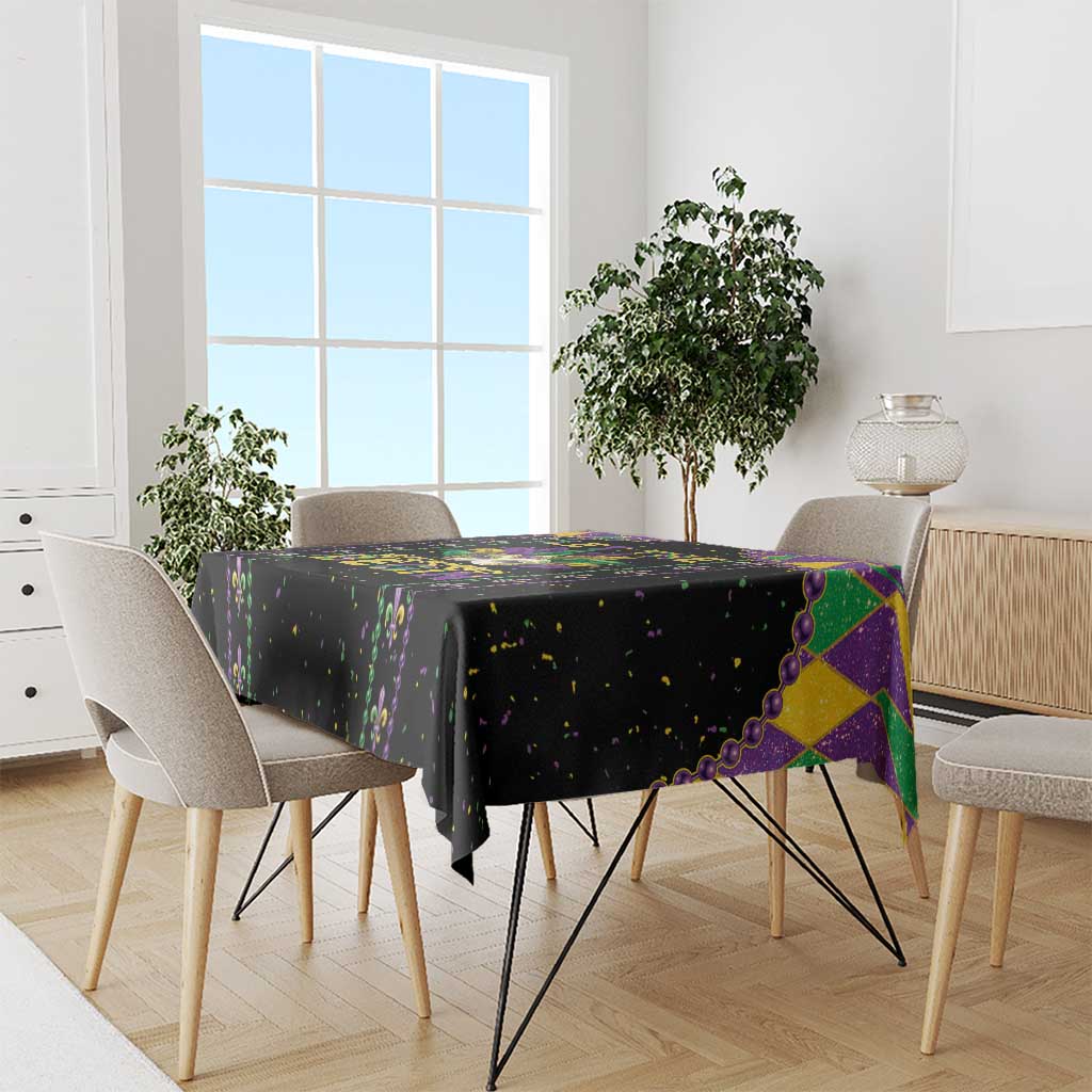 Black Mardi Gras tablecloth with colorful confetti and fleur-de-lis border