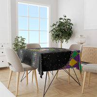 Black Mardi Gras tablecloth with colorful confetti and fleur-de-lis border