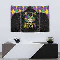 Black Mardi Gras tapestry with purple-green-yellow harlequin frame, mask artwork, and vertical bead strings.
