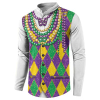 Mardi Gras button sweatshirt, white sleeves, glitter bead garlands over argyle vest