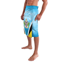 Blue lavalava shorts with Saint Lucia crest print panel and diagonal white/yellow trim