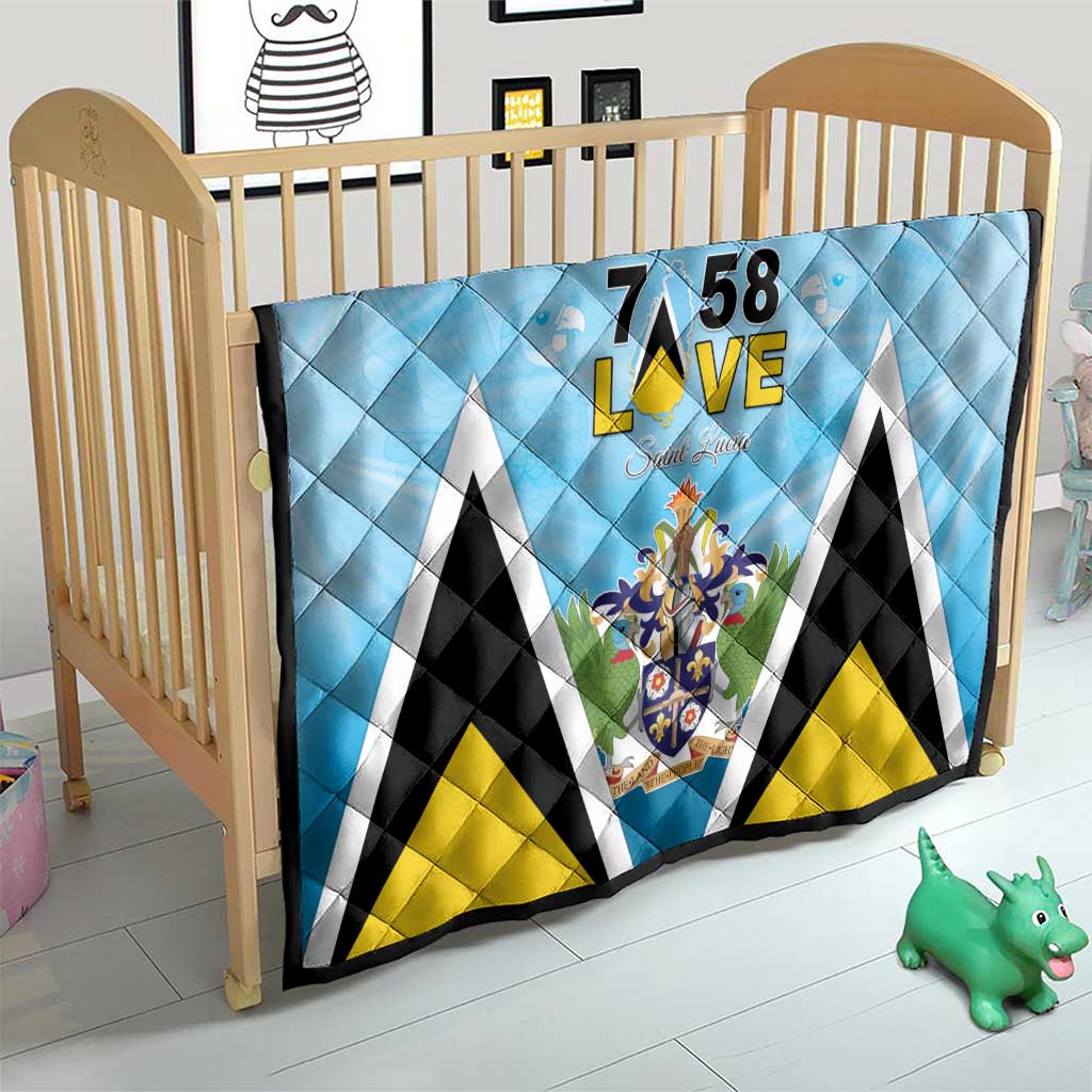 Light blue quilt blanket with diamond quilting, “7 58 L•VE” and Saint Lucia crest design