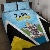 Blue quilt bed set with coat of arms graphic, “58” and two matching pillows