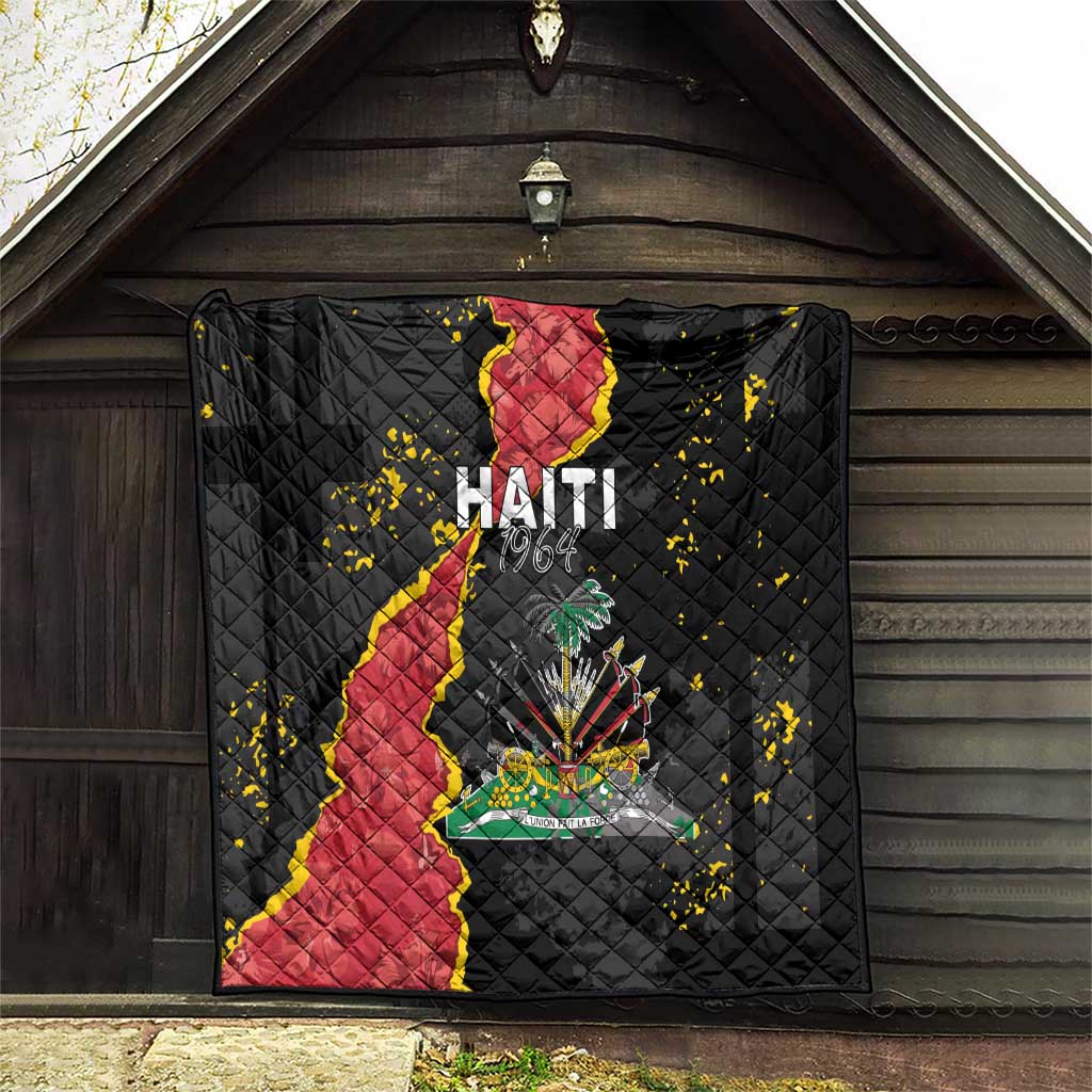 Black quilt blanket hanging on porch wall, showing Haiti map and coat of arms