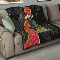 Black quilt blanket draped on sofa, Haiti map and coat of arms centered