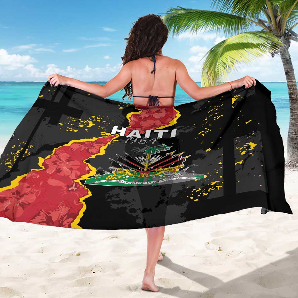 Black sarong coat wrap tied at sides, showing centered Haiti emblem graphic