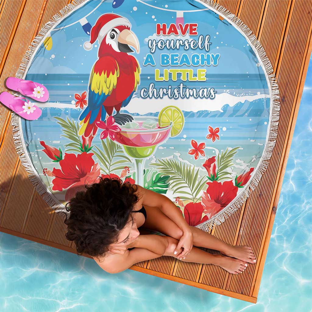 Round blue beach blanket with fringed edge, red macaw and hibiscus flowers