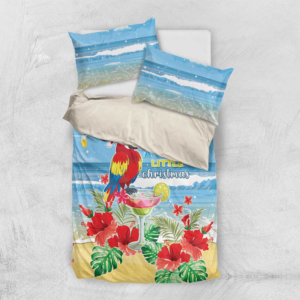 Blue tropical Christmas bedding set shown flat with duvet cover and two pillowcases
