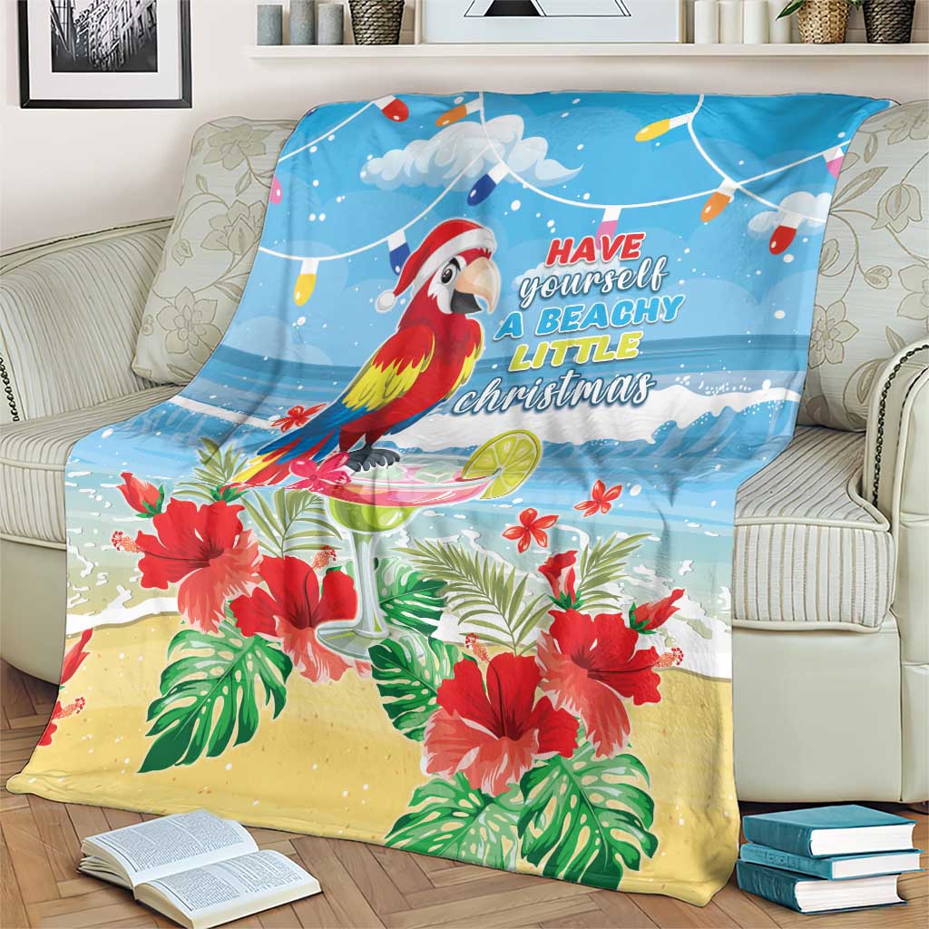 Blue tropical Christmas blanket with macaw, palm leaves, and beachy quote