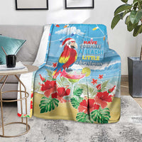 Blue tropical Christmas blanket with macaw, hibiscus flowers, and beachy quote