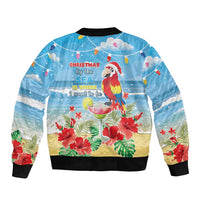 Blue bomber jacket back with tropical parrot, hibiscus flowers, Christmas beach text, black trim