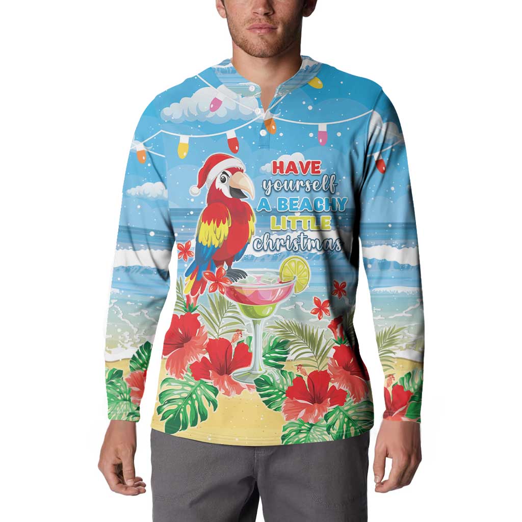 Blue button-up sweatshirt on model with macaw and tropical beach Christmas print
