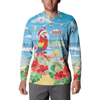 Blue button-up sweatshirt on model with macaw and tropical beach Christmas print