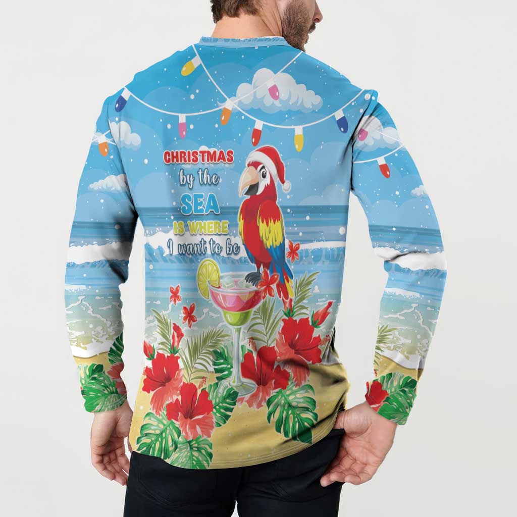 Blue button-up sweatshirt back on model with parrot, sea Christmas message, flowers