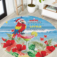 Round blue tropical Christmas rug with macaw parrot, hibiscus and leafy pattern