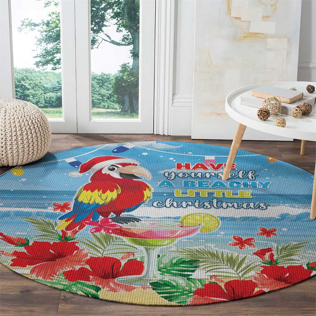 Round blue tropical Christmas rug with macaw parrot and lime slice, beachy Christmas lettering