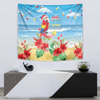 Blue tropical tapestry with macaw parrot, drink in foreground, red hibiscus blooms and waves