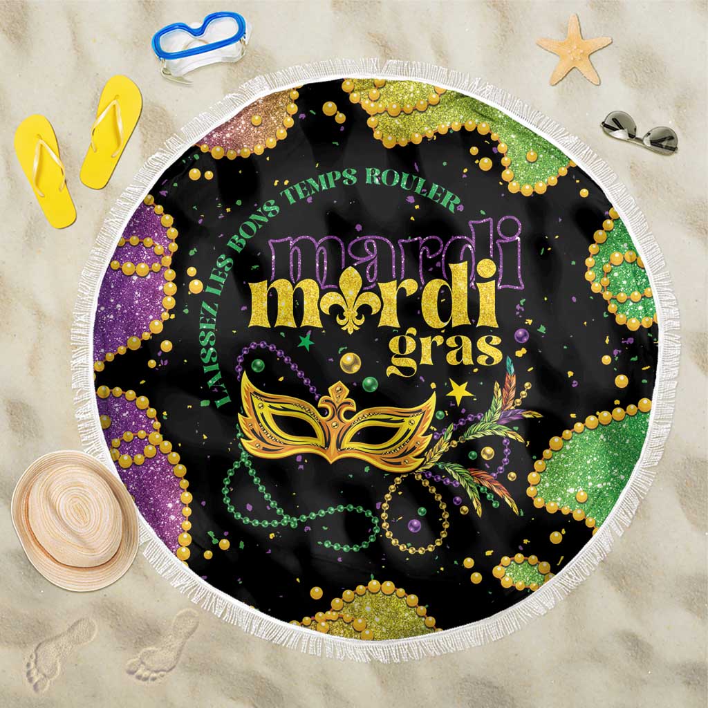 Round Mardi Gras beach blanket, black center with gold mask, purple beads, and white fringe