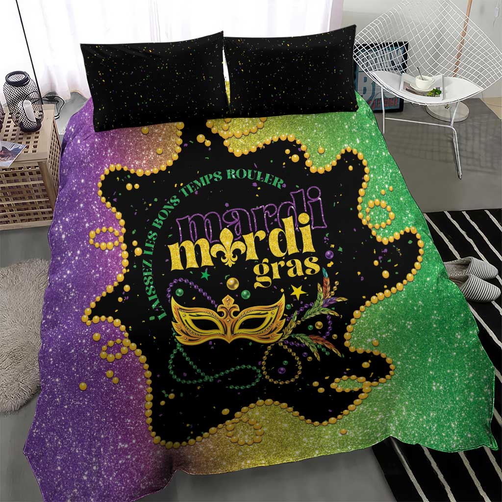 Mardi Gras bedding set with central mask graphic on purple-green duvet and black speckled pillows