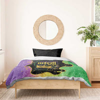 Mardi Gras bedding set with black speckled pillowcases and purple-green duvet with Mardi Gras mask
