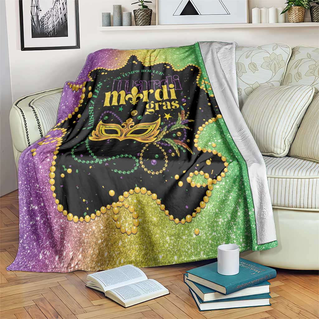 Colorful Mardi Gras blanket with purple-to-green glitter and gold fleur-de-lis mask