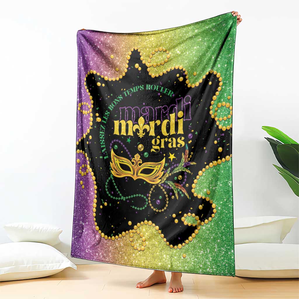 Colorful Mardi Gras blanket draped on couch, black center with gold mask and beads
