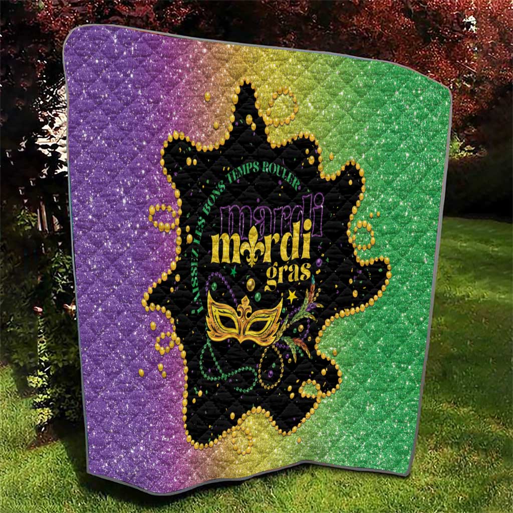Mardi Gras quilt with purple left, green right, black mask and gold bead accents
