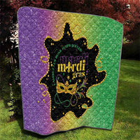 Mardi Gras quilt with purple left, green right, black mask and gold bead accents