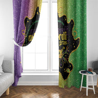 Mardi Gras window curtain with purple and green sides and black crest on gold trim
