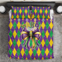 Colorful Mardi Gras bedding set with purple, green, and yellow diamond pattern and bow center