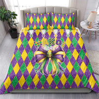 Mardi Gras comforter and pillowcases in purple, green, yellow diamonds with fleur-de-lis trim and bow
