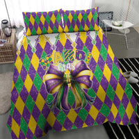 Mardi Gras bedding set with purple, green, yellow diamonds, central bow, and 'Mardi Gras' emblem