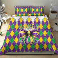 Colorful Mardi Gras bedding set with diamond pattern, fleur-de-lis border, and large purple bow