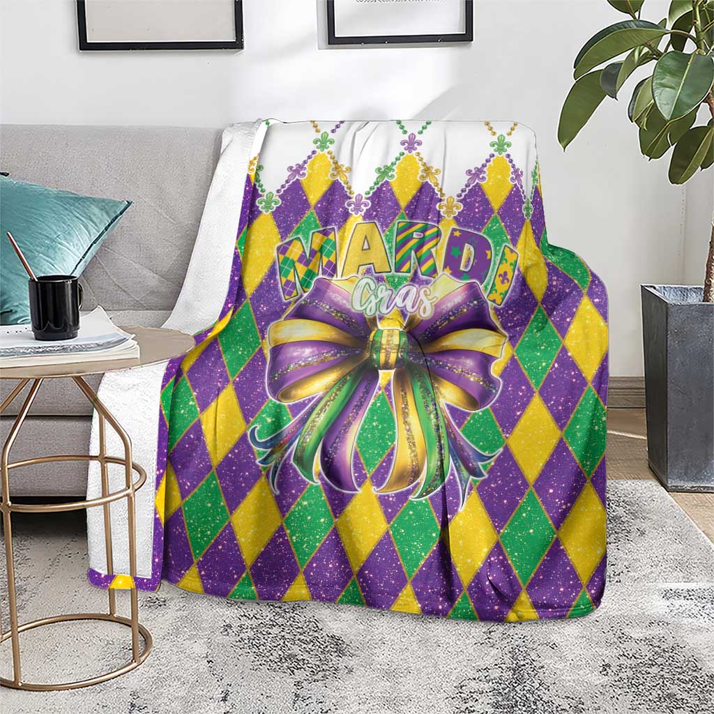 Mardi Gras blanket draped on couch, purple, green and yellow diamond design