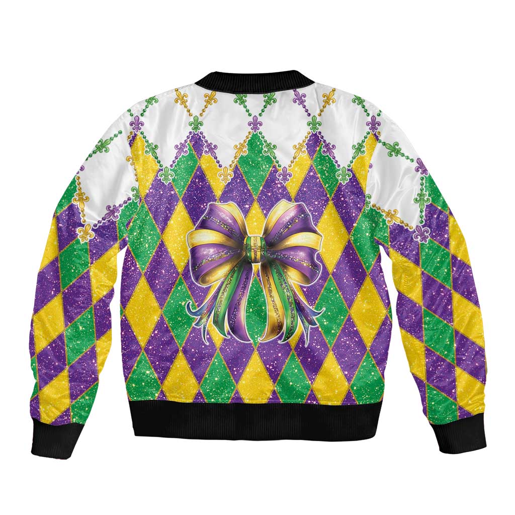 Colorful glitter bomber jacket with argyle diamond pattern and large purple-green bow graphic