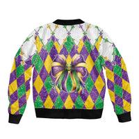 Colorful glitter bomber jacket with argyle diamond pattern and large purple-green bow graphic