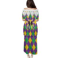Long glitter Mardi Gras-style dress back view, purple green gold argyle with big bow detail
