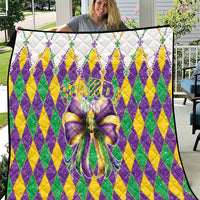 Colorful diamond-pattern quilt with large multicolor bow and fleur-de-lis accents