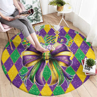 Round glitter Mardi Gras carpet with large purple-and-gold bow and colorful diamond border