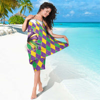 Purple, green, and yellow diamond sarong with glittery center bow