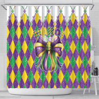 Mardi Gras shower curtain with colorful rhombus pattern, glitter, and purple bow center