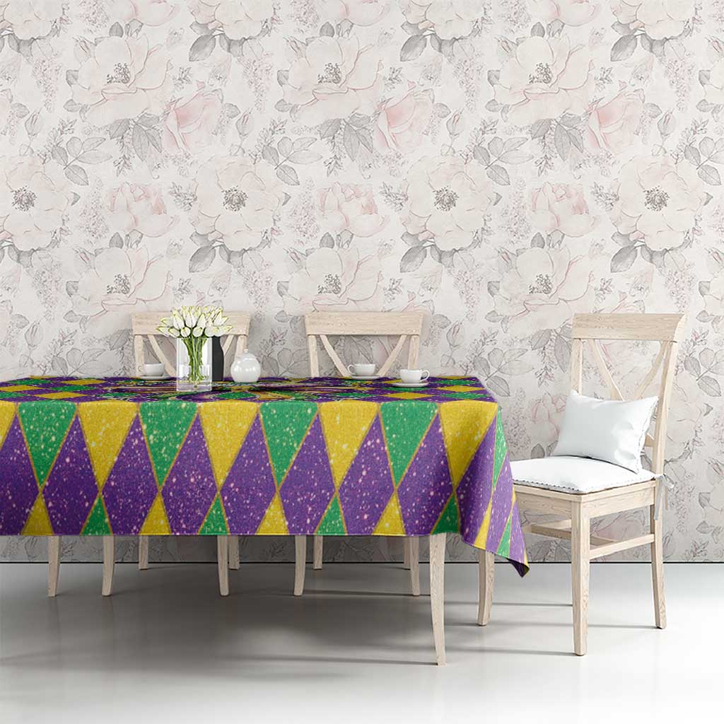 Purple, green, and gold glitter diamond tablecloth with multicolor bow detail