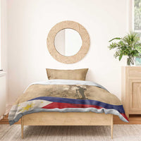 Brown memorial bedding set on bed with soldier silhouette and flag stripe design on duvet