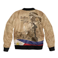 Brown bomber jacket with black ribbed neck and back camo graphic, full zip