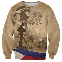 Brown crewneck sweatshirt with soldier silhouette graphic, “Home of the Free...Brave”