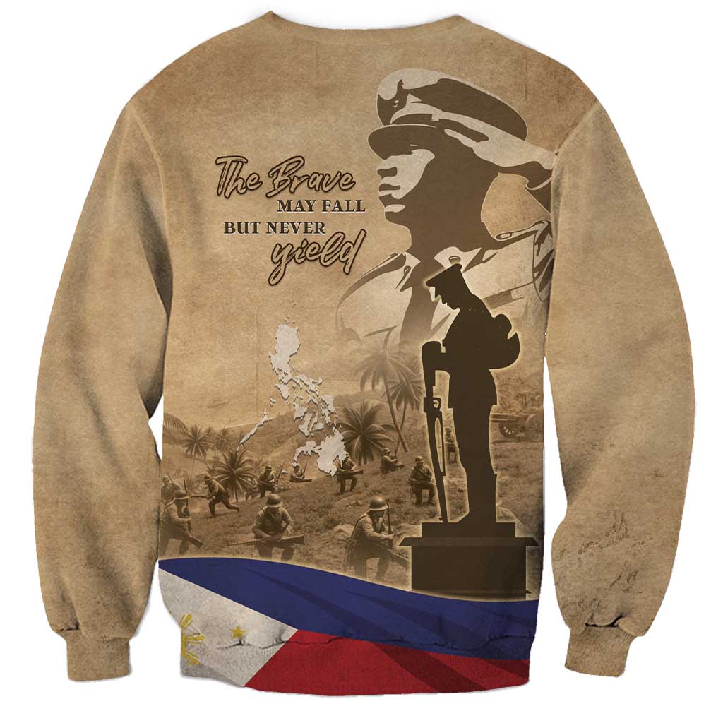 Brown crewneck sweatshirt with soldier silhouette and “The Brave May Fail...Never Yield”