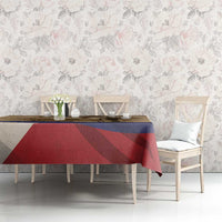 Brown memorial tablecloth on dining table with blue-red diagonal design