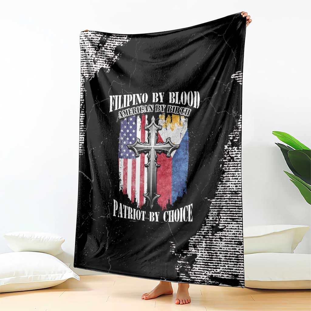 Black grunge throw blanket draped over couch, cross and flag print with bold text