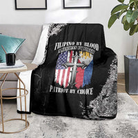 Black grunge throw blanket on gray sofa, cross-and-flag emblem and text centered